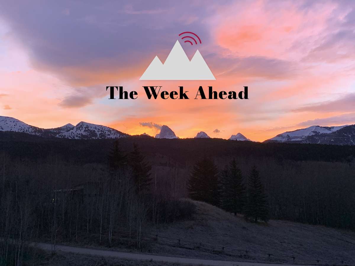 The Week Ahead logo over a sunset view of the Teton Range with snowy peaks and dark forest below